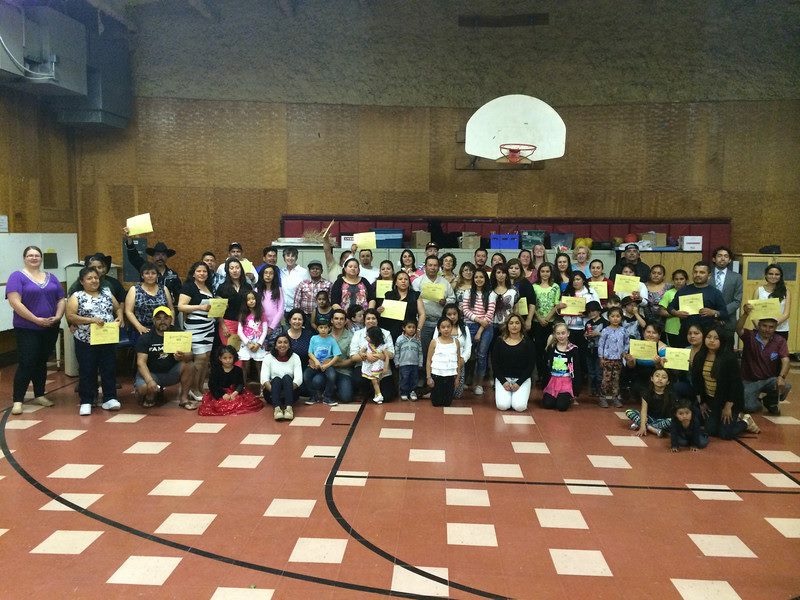 ESL students and teachers at graduation in the spring of 2014.