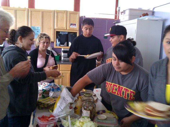 Members of Puente's Youth Program eat with members of Benicia Community Congregational Church