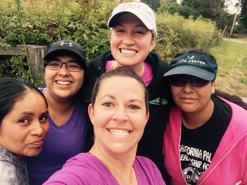 Yessenia Serratos, second from left, and Molly Wolfes, front center, with members of the Pescadero running and walking group one week.