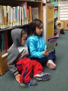 Reading together at the library.