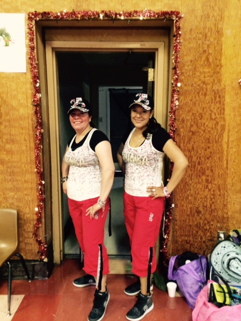 Arcelia Arenas and Erika Vera in between songs at the Zumba party on July 30.